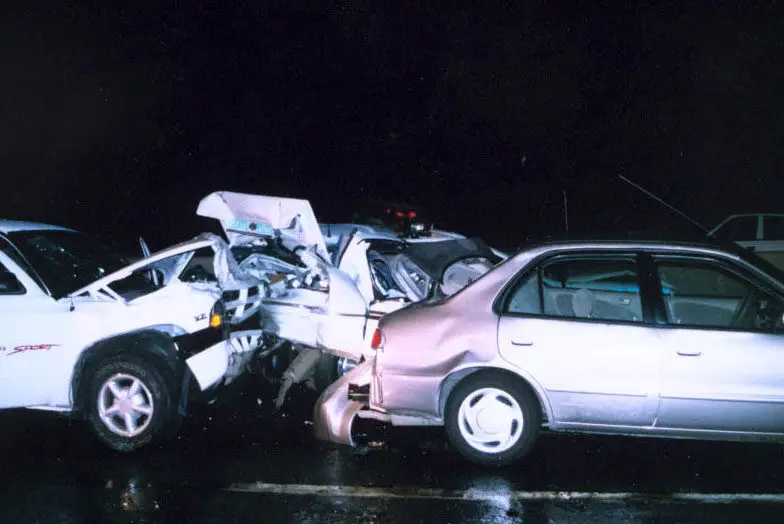 three car collision accident on a raining night
