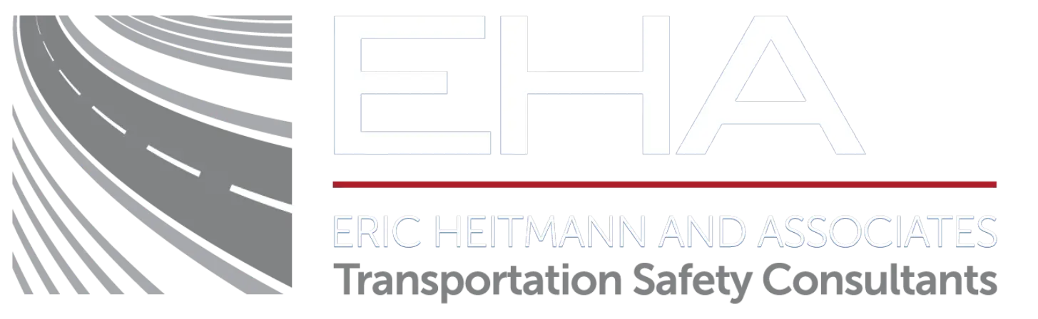 Logo with a curved road graphic/icon. White logo of EHA, Eric Heitmann and Associates Transportation Safety Consultants. Crash reconstructionist Accident investigator Accident investigations Accident expert Fleet consultant Fleet consulting Trucking Safety consulting Driver safety training